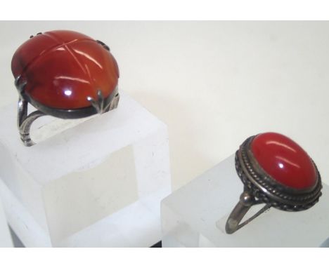 Two silver mounted agate rings size N and L. P&amp;P group 1 (£16 for the first item and £1.50 for subsequent items) 