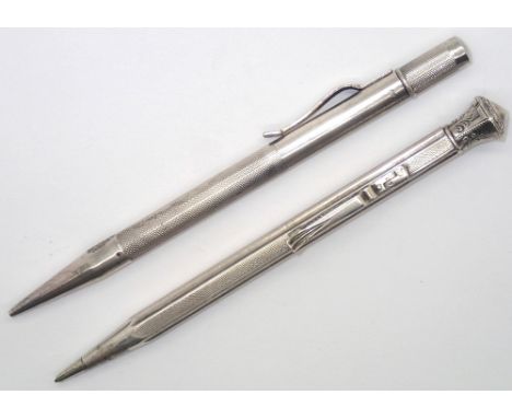 Two silver pencils, one sterling one 935 silver. P&amp;P group 1 (£16 for the first item and £1.50 for subsequent items) 