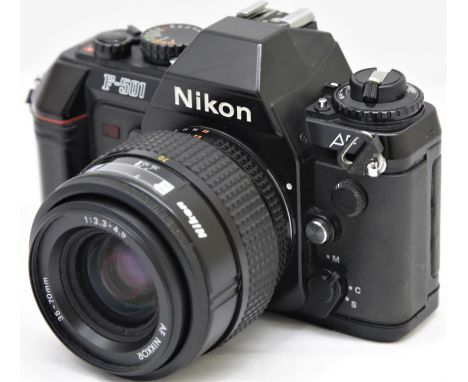 Nikon F-501 35mm film camera with AF Nikkor 35 - 70 zoom lens. P&amp;P group 2 (£20 for the first item and £2.50 for subseque