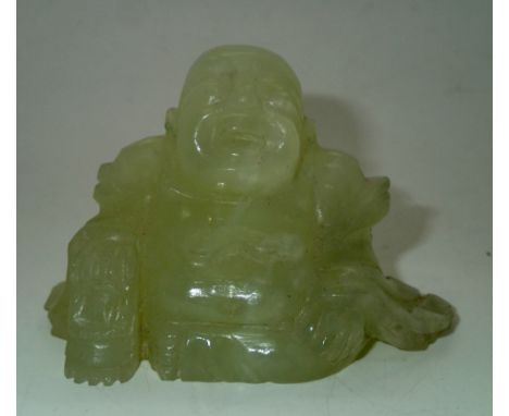 Carved Jade buddha, H: 6 cm. P&P group 1 (£16 for the first item and £1.50 for subsequent items)Condition Report: No visible 