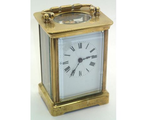 Brass cased carriage clock. Working at lotting up H: 11 cm. P&amp;P group 1 (16 for the first item and £1.50 for subsequent i