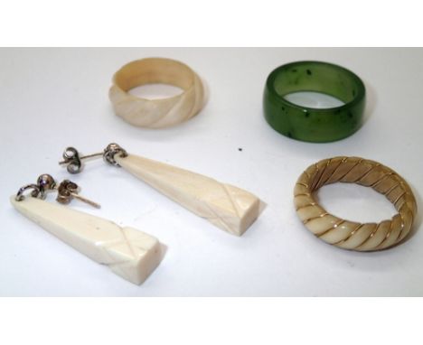 Pair of bone earrings two bone rings and a jade? ring. P&amp;P group 1 (£16 for the first item and £1.50 for subsequent items