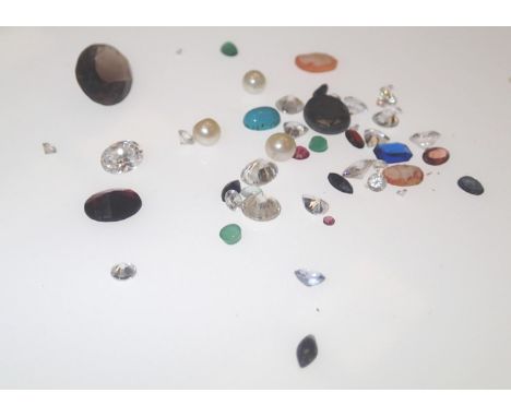 Loose gemstones: assorted stones to include ruby and topaz. P&amp;P group 1 (£16 for the first item and £1.50 for subsequent 