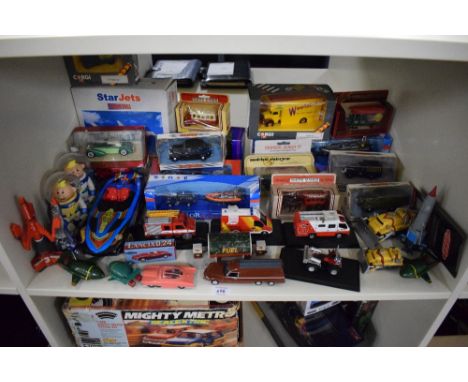 Mixed scale Die-casts, Corgi, Matchbox, Lledo and similar, boxed and loose, 30+ on one shelf