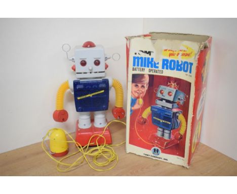 A Tomy Company Inc (japan) TP-705 battery operated and tin plate Mike Robot, wityh remote control on a wire, height 30cm, in 