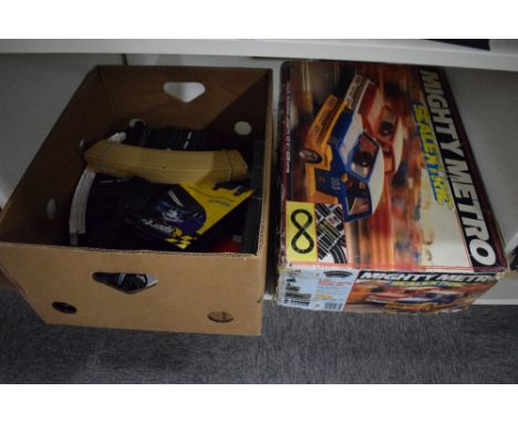 Vintage Scalextri, Hornby C880 Mighty Metro Racing set in original box with internal packaging along with a box of extra trac