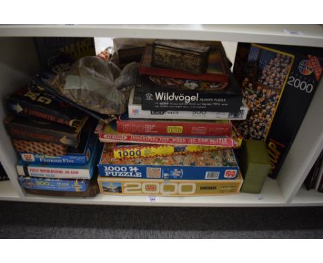 A shelf of mixed vintage Jig-saws including Waddington, MB, Victory, Falcon Star Patrol, all card pieces