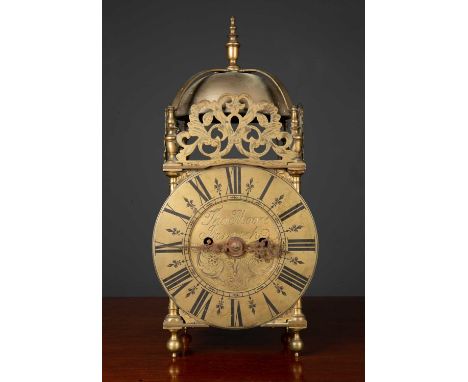 A 17th century style brass lantern clock 17cm wide x 14cm deep x 35cm highCondition report: Handle missing from side door, su