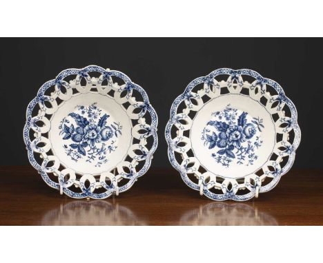 A pair of 18th century Worcester porcelain baskets decorated with fir cones and with crescent mark beneath, 20.5cm diameterCo