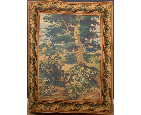 A late 20th century Aubusson style verdure tapestry panel depicting countryside with a church in the distance, all within an 