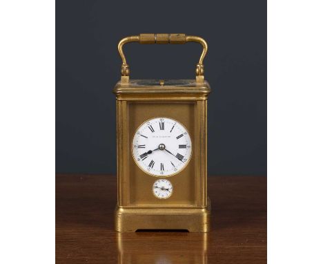 A French carriage clock retailed by Paul Garnier, the repeater movement striking the quarter hours on two gongs, and with ala