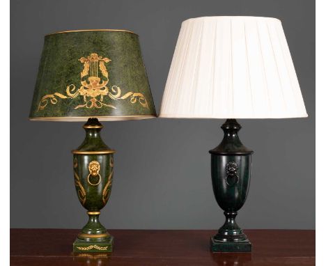 A green toleware table lamp and shade with lion mask ring handles, the lamp and shade 68cm high overall together with a furth