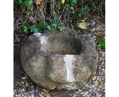 An ancient Fossil Stone mortar, in the form of a sun or star, found in Yorkshire, possible iron age or Celtic, broken and rep