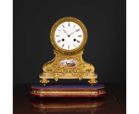 A good sized 19th century French ormolu and marble cased mantle clock the fluted drum movement on a scroll and acanthus leaf 