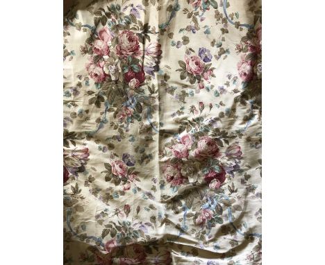 A pair ornament curtains or portiere  the curtains joined at the top and sewed to the pelmet, the curtains on a light brown g