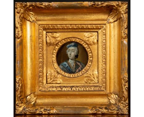 A miniature portrait of Bonny Prince Charlie, reverse glass painting, set within a decorative gilt frame, the picture 5.5cm d