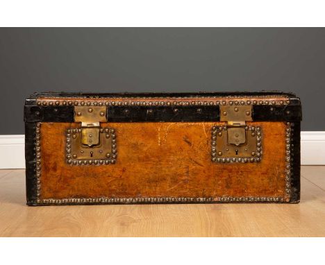 A small 19th century tan leather iron bound trunk or box 67cm wide x 33cm deep x 27cm highCondition report: scuffs marks and 