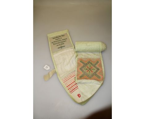 An unusual Edwardian strip sampler, executed by Dorothy DeVoy aged 13 and dated June 1905, detailing competency in many aspec