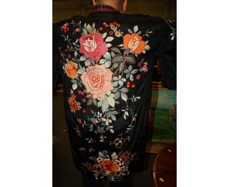 A 1920s/30s Chinese black silk robe, with embroidered flowers and sash belt, together with a collection of lady’s formal glov