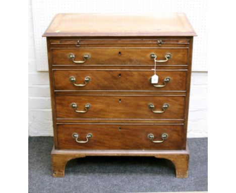 A George III mahogany bachelor's chest, the rectangular, crossbanded top with moulded edge over brushing slide and four gradu