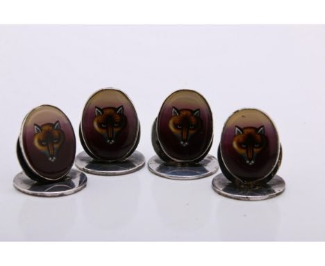 A set of our early 20th century silver and hard enamel name place holders, each decorated with the mask of a fox, Chester 190