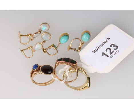 A pair of opal pendant earrings, composed of a pear-shaped opal suspending a circular opal, screw on fittings, a pair of turq