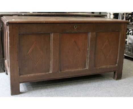 A 19th century three panel oak coffer, 115cm by 50cm by 61cm 