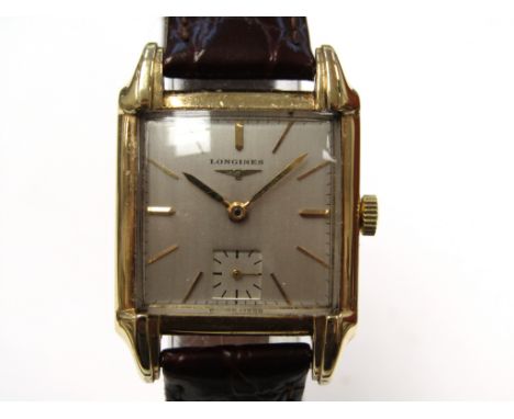 LONGINES: a 14ct gold tank-design manual wind gent's wristwatch of Deco design with stepped teardrop design lugs, silvered sq
