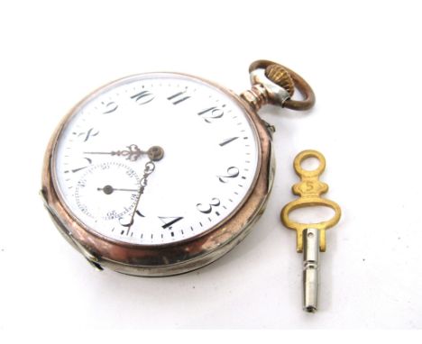 An early 20th Century Continental Galonnes open faced white metal pocket watch, Arabic enamelled dial with subsidiary seconds