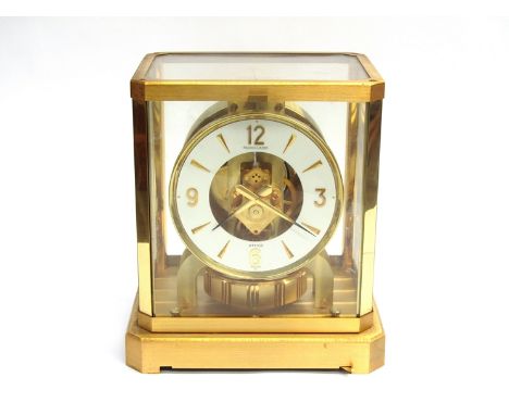 A mid to late 20th Century Jaeger LeCoultre Atmos clock in gilt brass and glazed casing, serial no. 365647, 23cm high