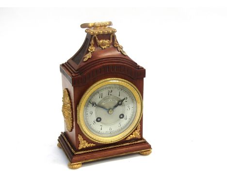 An early 20th Century French walnut and ormolu mounted mantel clock with silvered and engine turned dial, signed Mappin &amp;