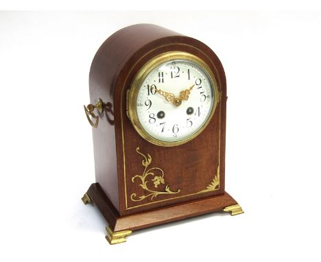 A mid 19th Century French mahogany and brass inlaid mantel clock of arched form, Arabic enamelled convex dial (a/f) with pier