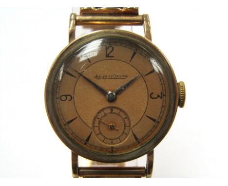 JAEGER LE-COULTRE: A 9ct gold cased gent's manual wind wristwatch with P469/A calibre movement, serial no. 381143, foxing to 