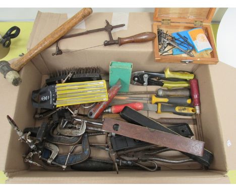 A box of mixed hand tools including piercing and hack saws, hammers, pliers, clamps, files, spirit levels etc