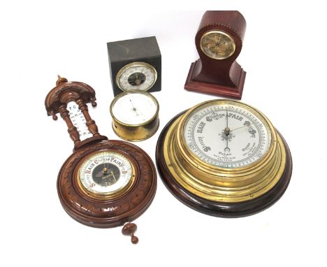 A Victorian wall barometer/thermometer in carved walnut case, Edwardian aneroid barometer in brasss case on wooden mount, a m