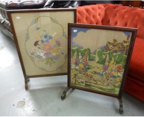 TWO MAHOGANY CHEVAL GRATE SCREENS WITH GLAZED AND PICTORIAL NEEDLEWORK TAPESTRY PANELS