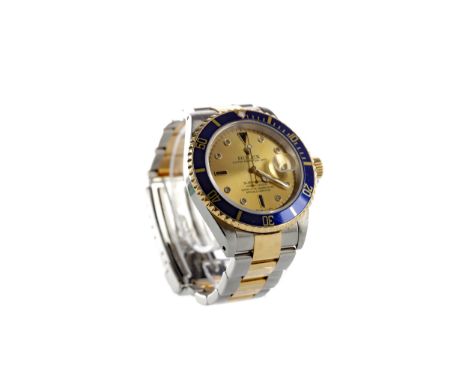 GENTLEMAN'S ROLEX SUBMARINER DIAMOND SET BICOLOUR AUTOMATIC WRIST WATCH, model 16613, dated 2002, the round champagne dial wi