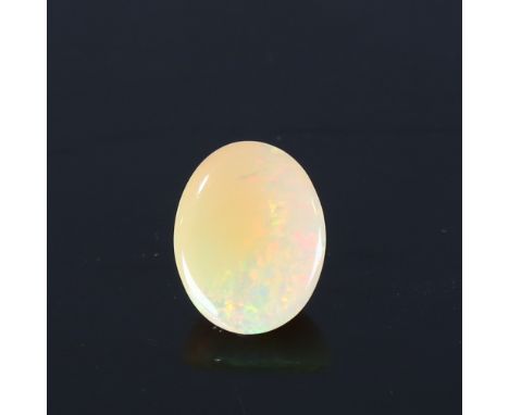 6.72ct unmounted oval cabochon light yellow opal, dimensions: 15.84 x 12.59 x 7.15mm, 1.35g, with IGITL Gemstone ReportNo dam