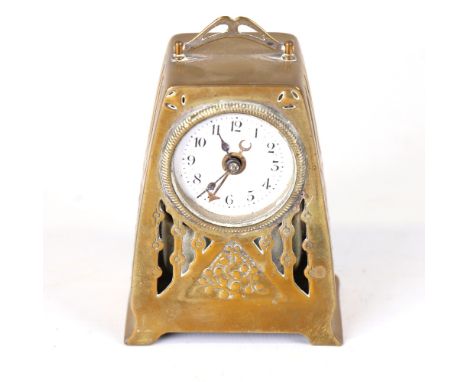 A German Arts and Crafts brass-cased alarm clock, white enamel dial with Arabic numerals and pierced case, case height 9cm, n