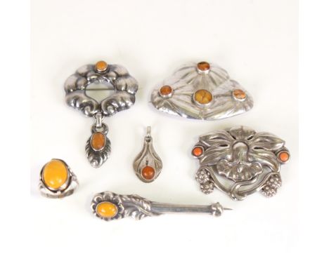 6 Danish Art Nouveau silver and amber and coral pieces of jewellery, comprising 4 brooches and a ring, size R, 48.1g total (6