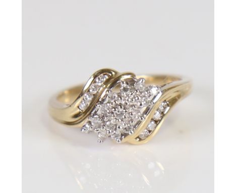 A modern 9ct gold diamond cluster dress ring, total diamond content approx 0.26ct, setting height 11.2mm, size O, 3.4gNo dama