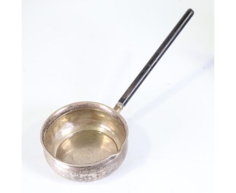 A mid-20th century Danish silver toddy ladle, with plain ebonised handle, engraved Jarly, hallmarks 1947, bowl diameter 8.5cm