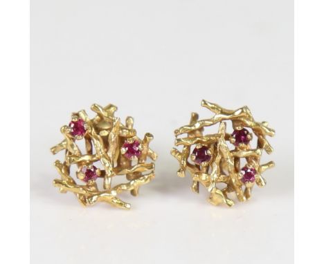 A pair of late 20th century 9ct gold ruby abstract earrings, naturalistic textured settings with stud fittings, indistinct ha