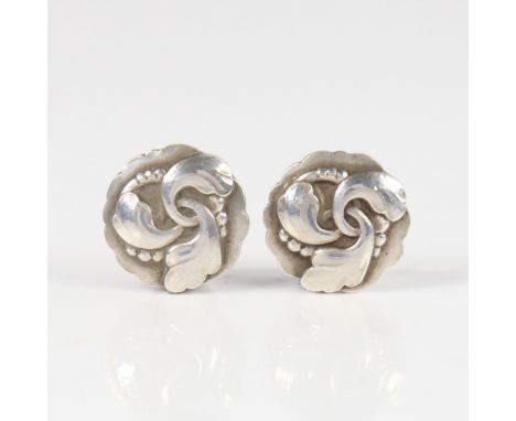 GEORG JENSEN - a Vintage Danish pair of clip earrings, stylised sterling silver floral settings, model no. 93, earring diamet