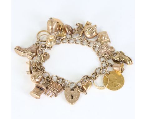 A late 20th century 9ct gold curb link charm bracelet, with 20 gold charms including sixpence, bar taps, 14K signet ring, etc