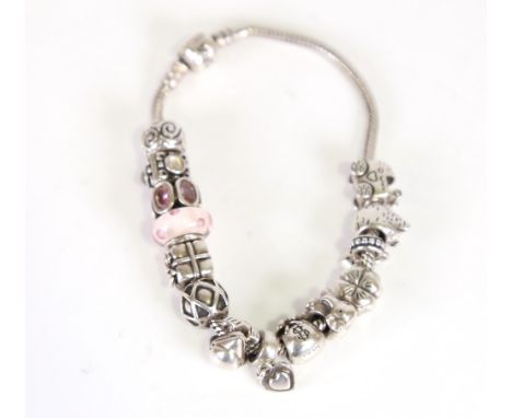 PANDORA - a modern sterling silver snake link charm bracelet, with 14 charms, 66.2gNo damage or repairs, settings lightly abr