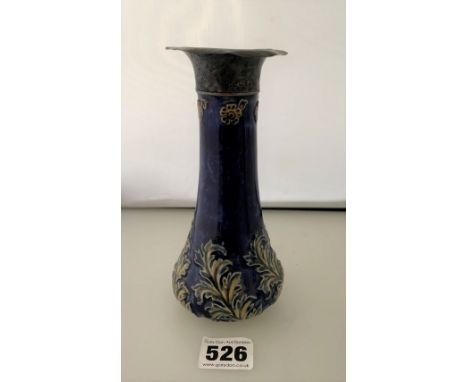 Royal Doulton blue candlestick with silver sconce. 6.5” high. Damage to screw top (hidden under sconce) and dents on sconce.