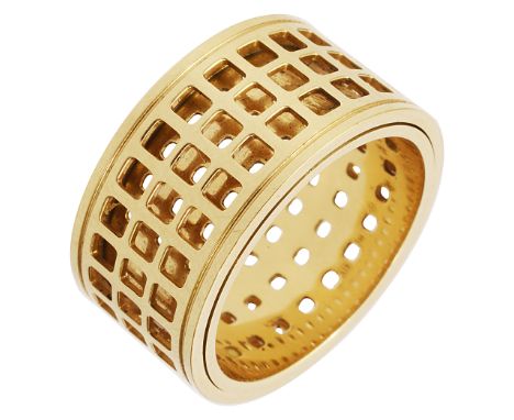 An 18ct yellow gold 'pantheon' ring by Gucci, composed of two revolving bands with openwork square lattice decoration9.2g, si