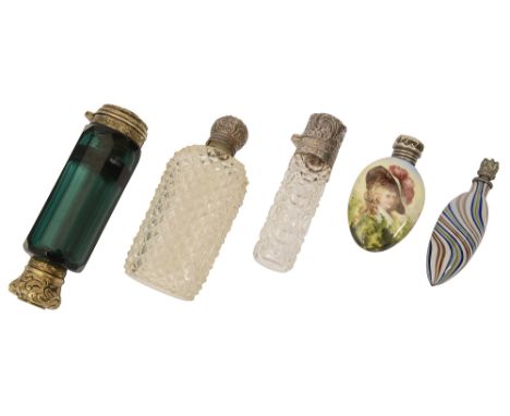 An early Victorian gilt metal mounted doubles ended green glass scent bottle and vinaigrette, a late Victorian silver mounted