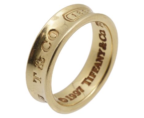 An 18ct gold Tiffany &amp; Co. '1837' ring, hallmarked London, 2004, stamped to outside '750, T &amp; Co. 1837', stamped inne